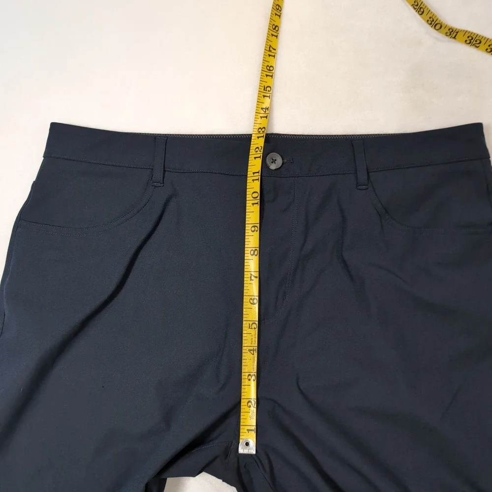 Vuori Meta Pant Men 36 Navy Blue Slim Taper 4-Way Stretch Tech V4009 Performance